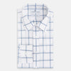 View 5 of product Large Checked Grey on White Weekend Fit Shirt in Cotton by Turnbull & Asser UK, featuring a white long-sleeve button-up design with a grey windowpane check pattern, front chest pocket, pointed derby collar, and buttoned cuffs, displayed flat on a plain white background.