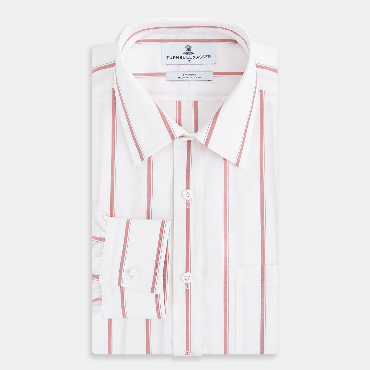 View 5 of product The Turnbull & Asser UK Track Striped Red on White Weekend Fit Shirt in Cotton features bold dark red stripes on a crisp white base, with long sleeves, a derby collar, front chest pocket, and buttoned cuffs, laid flat on a white background for a timeless men’s dress shirt aesthetic.