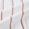 View 6 of product The Turnbull & Asser UK Track Striped Red on White Weekend Fit Shirt in Cotton features bold dark red stripes on a crisp white base, with long sleeves, a derby collar, front chest pocket, and buttoned cuffs, laid flat on a white background for a timeless men’s dress shirt aesthetic.