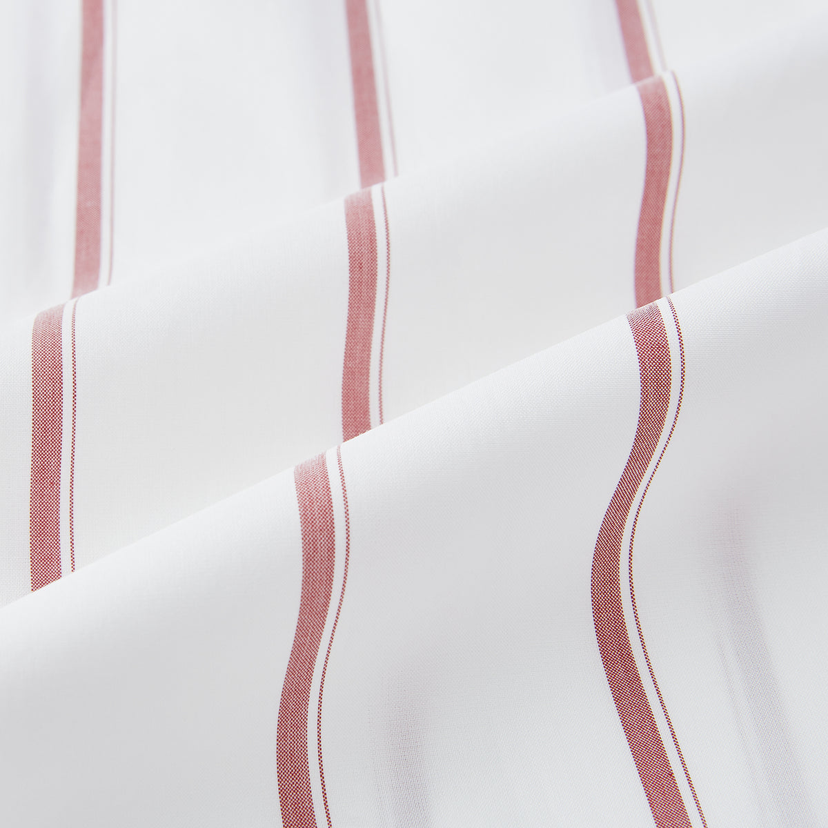 View 6 of product The Turnbull & Asser UK Track Striped Red on White Weekend Fit Shirt in Cotton features bold dark red stripes on a crisp white base, with long sleeves, a derby collar, front chest pocket, and buttoned cuffs, laid flat on a white background for a timeless men’s dress shirt aesthetic.