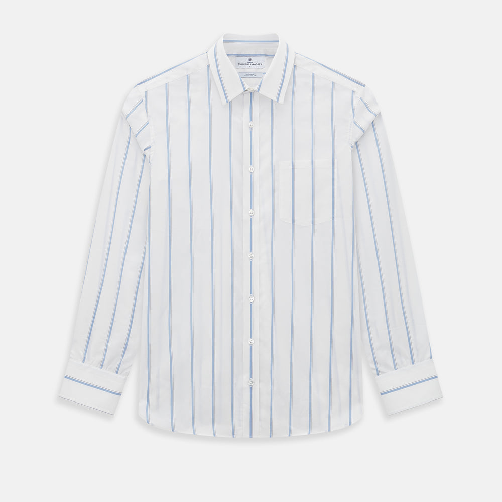 The Turnbull & Asser UK Track Striped Blue on White Weekend Fit Shirt in Cotton is a long-sleeve, button-up shirt featuring blue stripes on premium white Italian cotton, a Derby collar, and a chest pocket, elegantly laid flat against a white background.