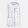 View 5 of product The Turnbull & Asser UK Track Striped Blue on White Weekend Fit Shirt in Cotton is a long-sleeve, button-up shirt featuring blue stripes on premium white Italian cotton, a Derby collar, and a chest pocket, elegantly laid flat against a white background.