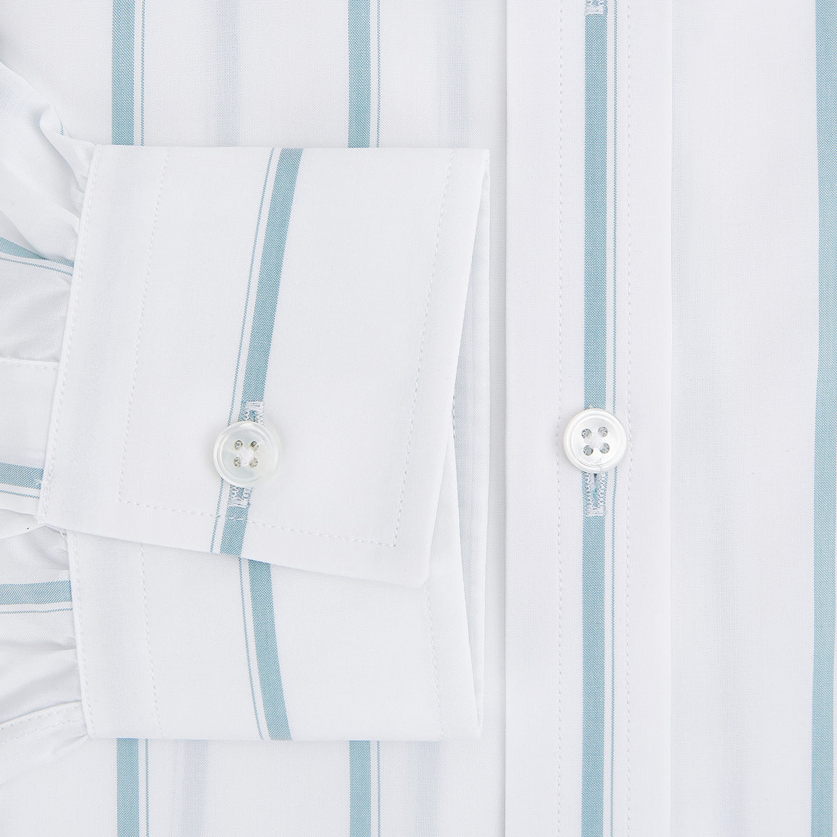 View 4 of product The Turnbull & Asser UK SHIRTS WF DERBY COLLAR 1BC 1PKT WHITE/SAGE STRIPE shirt features thin vertical blue stripes, a pointed Derby collar, and a single front pocket on the left chest, displayed laid flat on a white background.