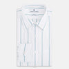 View 5 of product The Turnbull & Asser UK SHIRTS WF DERBY COLLAR 1BC 1PKT WHITE/SAGE STRIPE shirt features thin vertical blue stripes, a pointed Derby collar, and a single front pocket on the left chest, displayed laid flat on a white background.