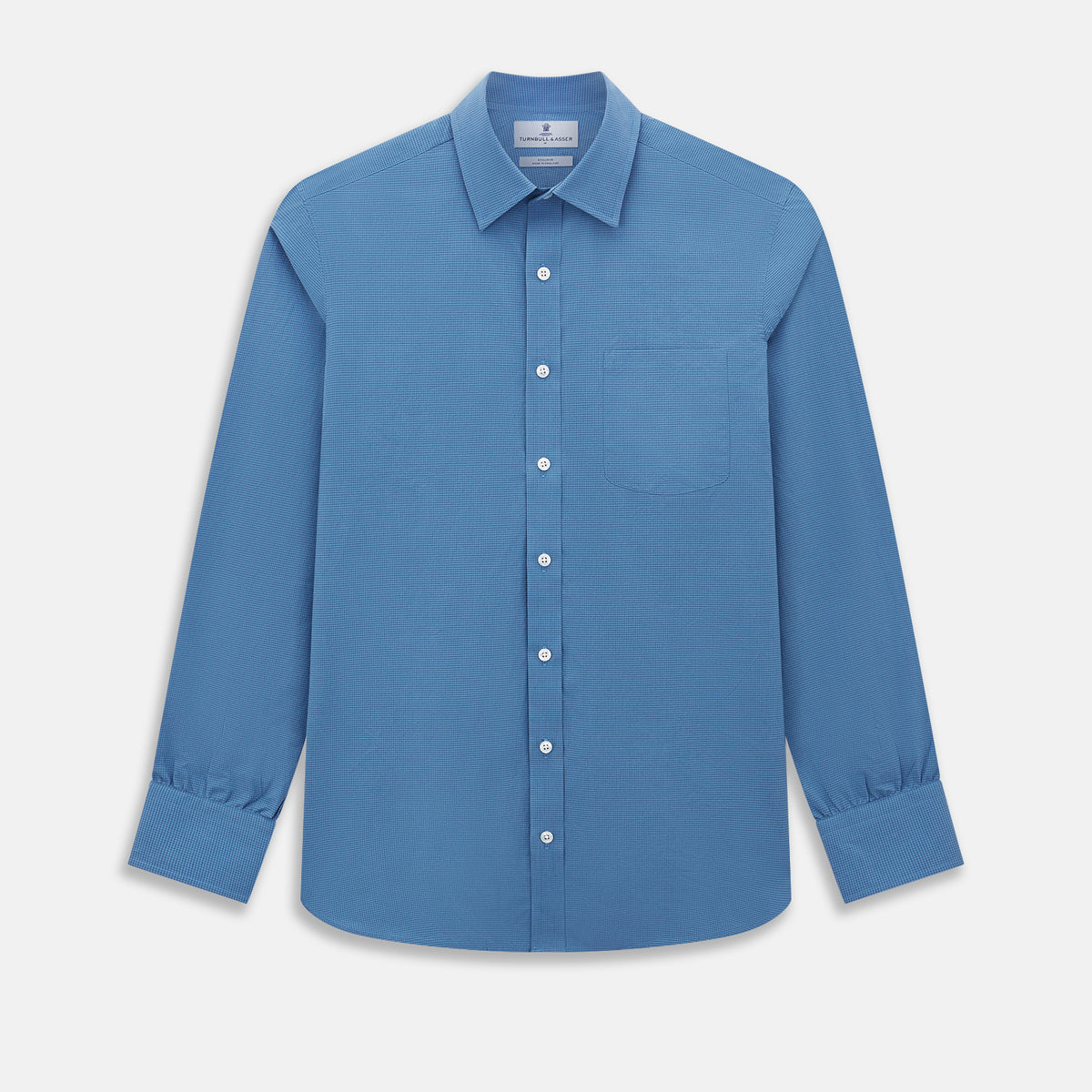 View 1 of product Turnbull & Asser UK Fine Checked Colony Blue Weekend Fit Shirt in Cotton, a navy check long-sleeved button-down with a Derby collar, a small checkered pattern, and a single chest pocket.