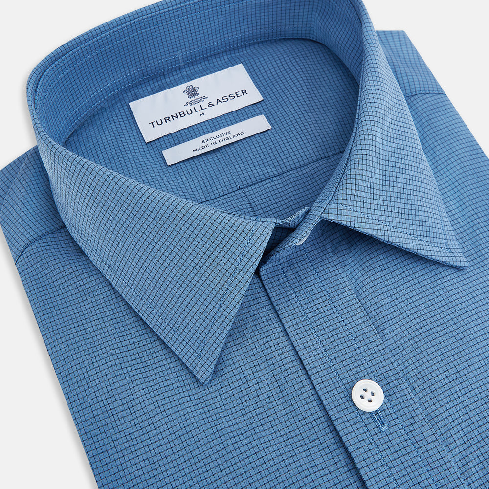 Turnbull & Asser UK Fine Checked Colony Blue Weekend Fit Shirt in Cotton, a navy check long-sleeved button-down with a Derby collar, a small checkered pattern, and a single chest pocket.