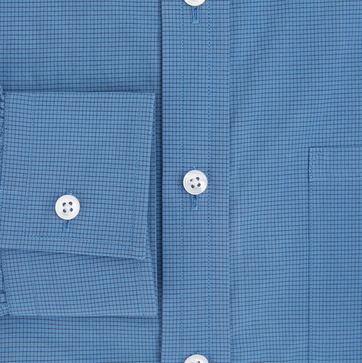 View 4 of product Turnbull & Asser UK Fine Checked Colony Blue Weekend Fit Shirt in Cotton, a navy check long-sleeved button-down with a Derby collar, a small checkered pattern, and a single chest pocket.