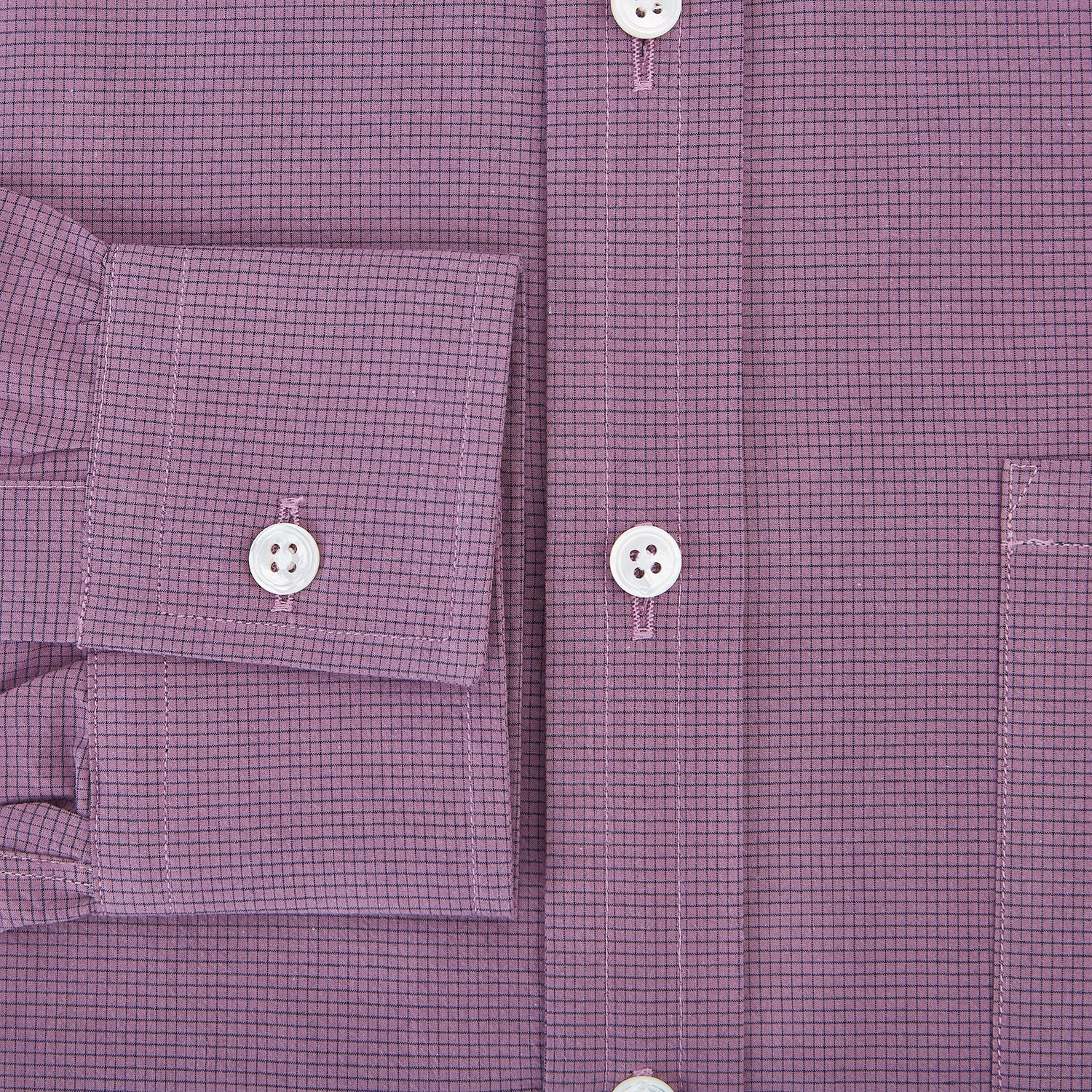 View 4 of product A long-sleeve, button-up pure cotton shirt—the Striped Navy on Antique Pink Weekend Fit Shirt by Turnbull & Asser UK—features subtle navy stripes on antique pink, a front chest pocket, white buttons, and a classic collar, displayed on a white background—a timeless nod to English shirtmaking.