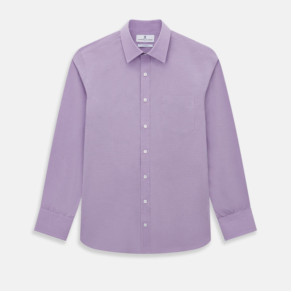 A long-sleeved, button-up Fine Checked Baby Pink Weekend Fit Shirt in Cotton by Turnbull & Asser UK, featuring a single chest pocket and a classic collar design, laid flat on a white background.