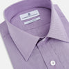 View 2 of product A long-sleeved, button-up Fine Checked Baby Pink Weekend Fit Shirt in Cotton by Turnbull & Asser UK, featuring a single chest pocket and a classic collar design, laid flat on a white background.