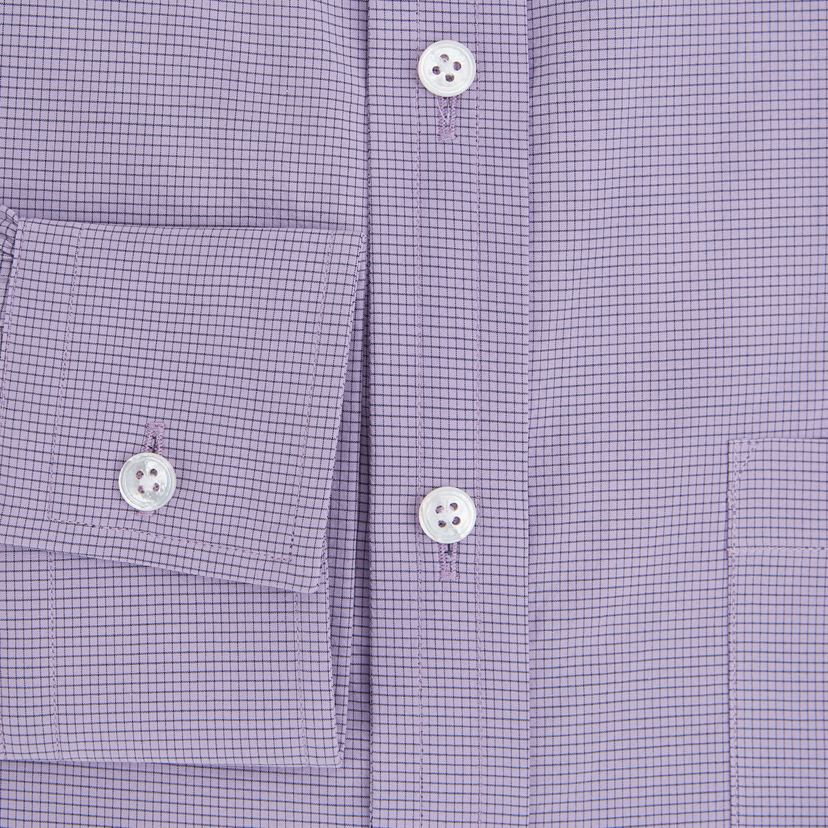View 4 of product A long-sleeved, button-up Fine Checked Baby Pink Weekend Fit Shirt in Cotton by Turnbull & Asser UK, featuring a single chest pocket and a classic collar design, laid flat on a white background.