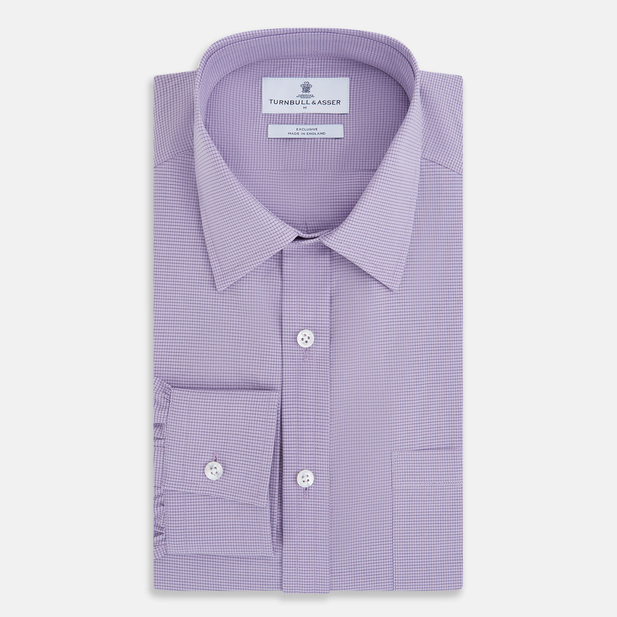 View 5 of product A long-sleeved, button-up Fine Checked Baby Pink Weekend Fit Shirt in Cotton by Turnbull & Asser UK, featuring a single chest pocket and a classic collar design, laid flat on a white background.