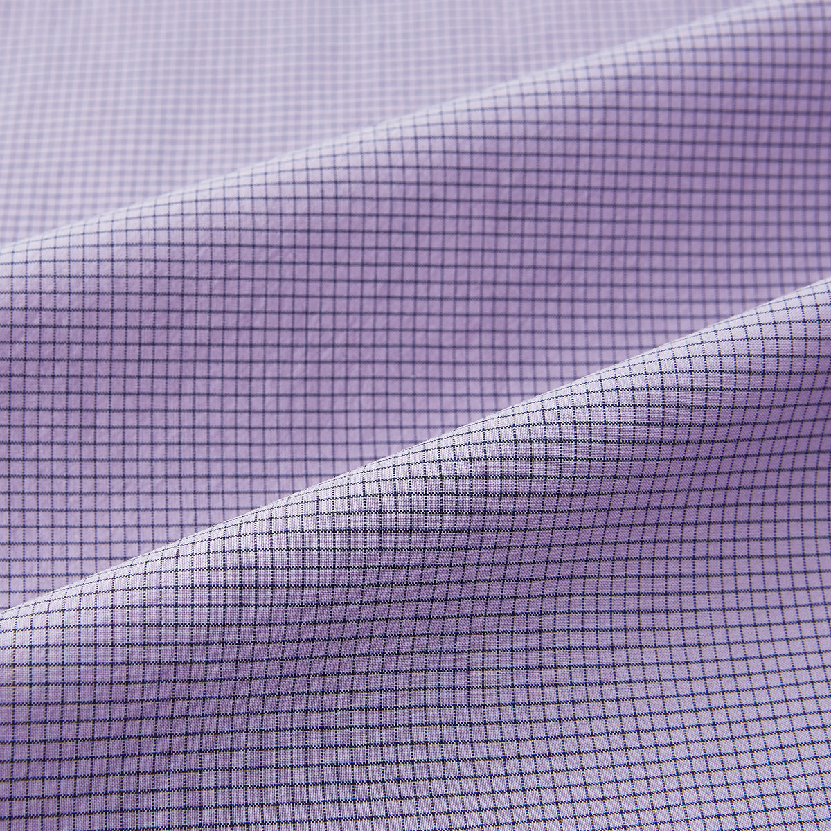 View 6 of product A long-sleeved, button-up Fine Checked Baby Pink Weekend Fit Shirt in Cotton by Turnbull & Asser UK, featuring a single chest pocket and a classic collar design, laid flat on a white background.
