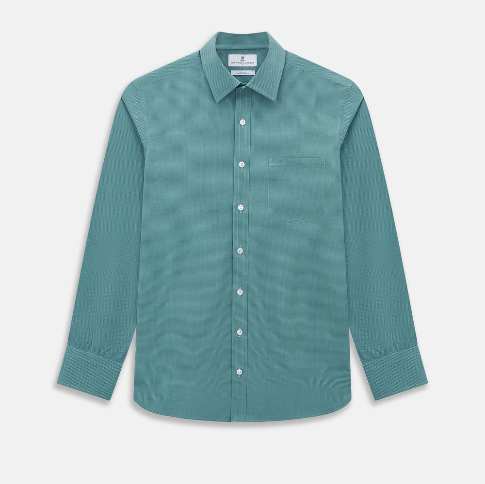 A Fine Checked Sage Green Weekend Fit Shirt in Cotton by Turnbull & Asser UK, featuring long sleeves, a button-up front, chest pocket, buttoned cuffs, and a classic collar—displayed on a white background—offers a modern twist reminiscent of the timeless appeal of classic checked shirts.