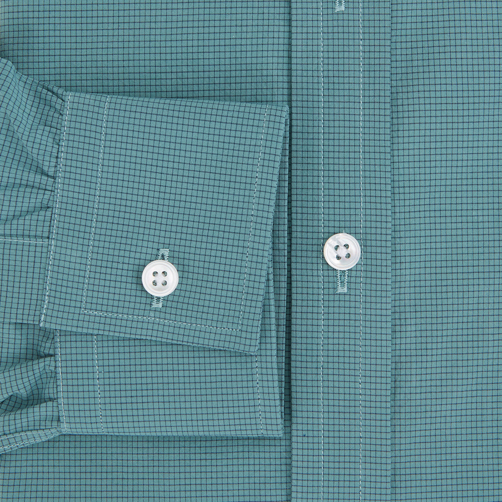 A Fine Checked Sage Green Weekend Fit Shirt in Cotton by Turnbull & Asser UK, featuring long sleeves, a button-up front, chest pocket, buttoned cuffs, and a classic collar—displayed on a white background—offers a modern twist reminiscent of the timeless appeal of classic checked shirts.