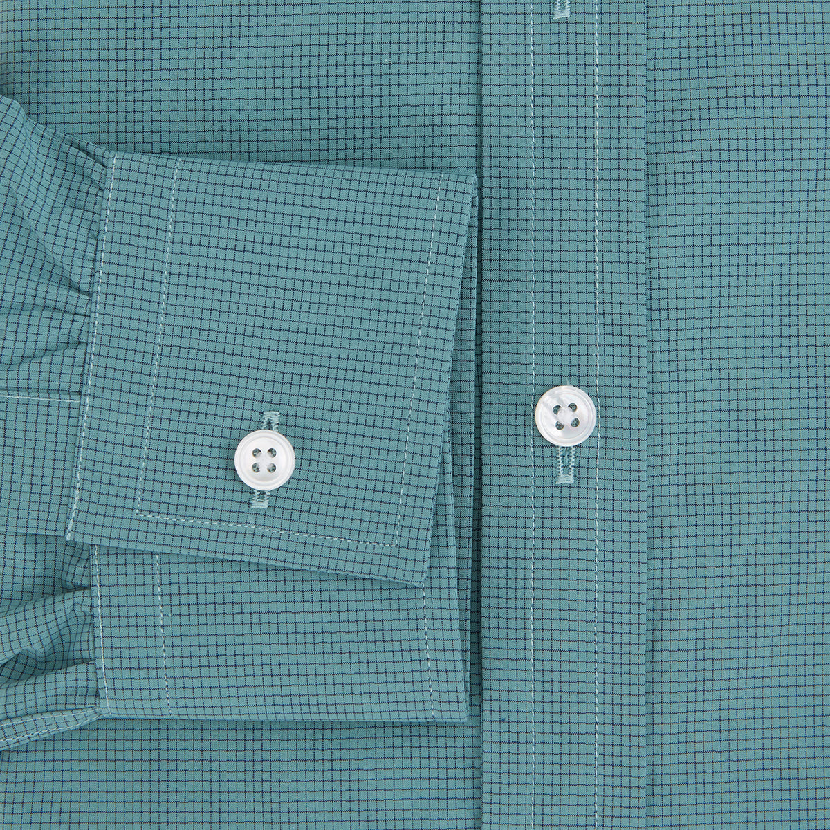 View 4 of product A Fine Checked Sage Green Weekend Fit Shirt in Cotton by Turnbull & Asser UK, featuring long sleeves, a button-up front, chest pocket, buttoned cuffs, and a classic collar—displayed on a white background—offers a modern twist reminiscent of the timeless appeal of classic checked shirts.