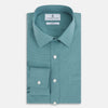 View 5 of product A Fine Checked Sage Green Weekend Fit Shirt in Cotton by Turnbull & Asser UK, featuring long sleeves, a button-up front, chest pocket, buttoned cuffs, and a classic collar—displayed on a white background—offers a modern twist reminiscent of the timeless appeal of classic checked shirts.