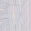 View 3 of product The Turnbull & Asser Multi Pencil Stripe Richmond Shirt features long sleeves, a Derby collar, left chest pocket, and light blue, red, and white pencil stripes. It is laid flat on a white background.