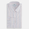 View 4 of product The Turnbull & Asser Multi Pencil Stripe Richmond Shirt features long sleeves, a Derby collar, left chest pocket, and light blue, red, and white pencil stripes. It is laid flat on a white background.