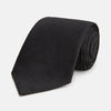View 1 of product The Turnbull & Asser Black Lace Silk Tie, featuring a refined texture, is elegantly displayed on a white background.