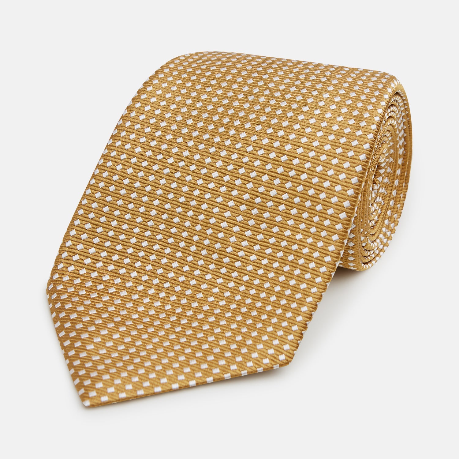View 1 of product A Turnbull & Asser Light Brown and White Diamond Silk Tie, featuring a refined white geometric pattern, ideal for modern office wear, shown rolled on a plain white background.