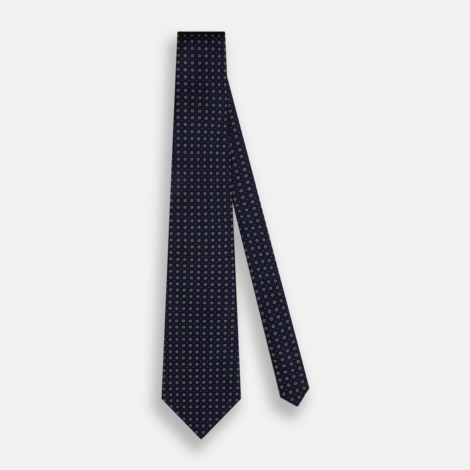 View 2 of product The Turnbull & Asser Navy and Light Green Circle Silk Tie features a navy base with small light green circular patterns, crafted from fine silk.