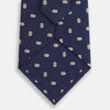 View 3 of product The Turnbull & Asser Blue and Yellow Links Silk Tie features a refined zigzag texture and a repeating pattern of interlocking gold and blue rings—the perfect sophisticated accent for the modern gentleman, especially paired with Turnbull & Asser shirts.