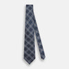 View 2 of product The Turnbull & Asser Navy Triple Check Silk Tie features a light blue and white plaid pattern—an essential accessory for the modern gentleman and a perfect complement to any Turnbull & Asser shirt.