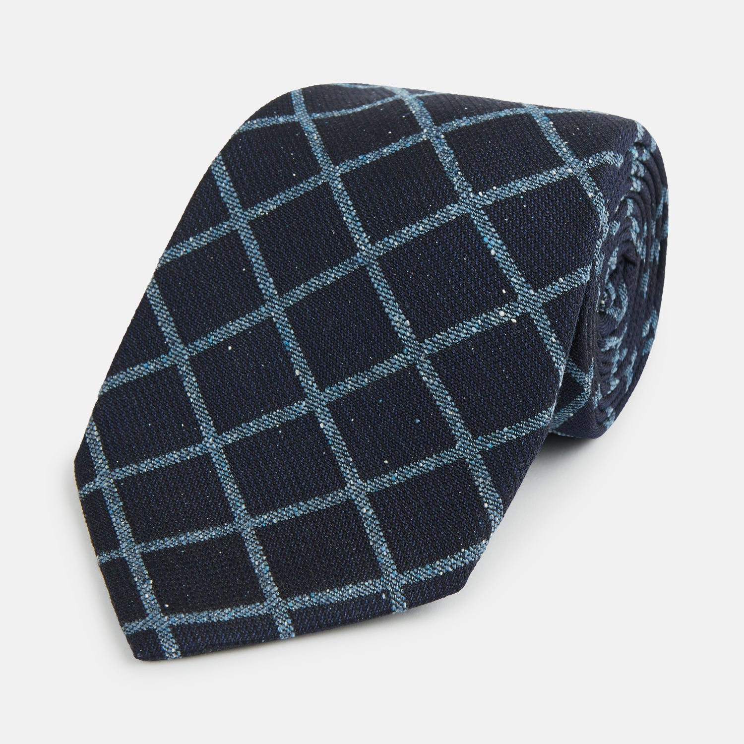 View 1 of product The Blue Diagonal Check Silk Blend Tie by Turnbull & Asser features a navy and light blue check pattern—a crisp accent for your favorite shirts.
