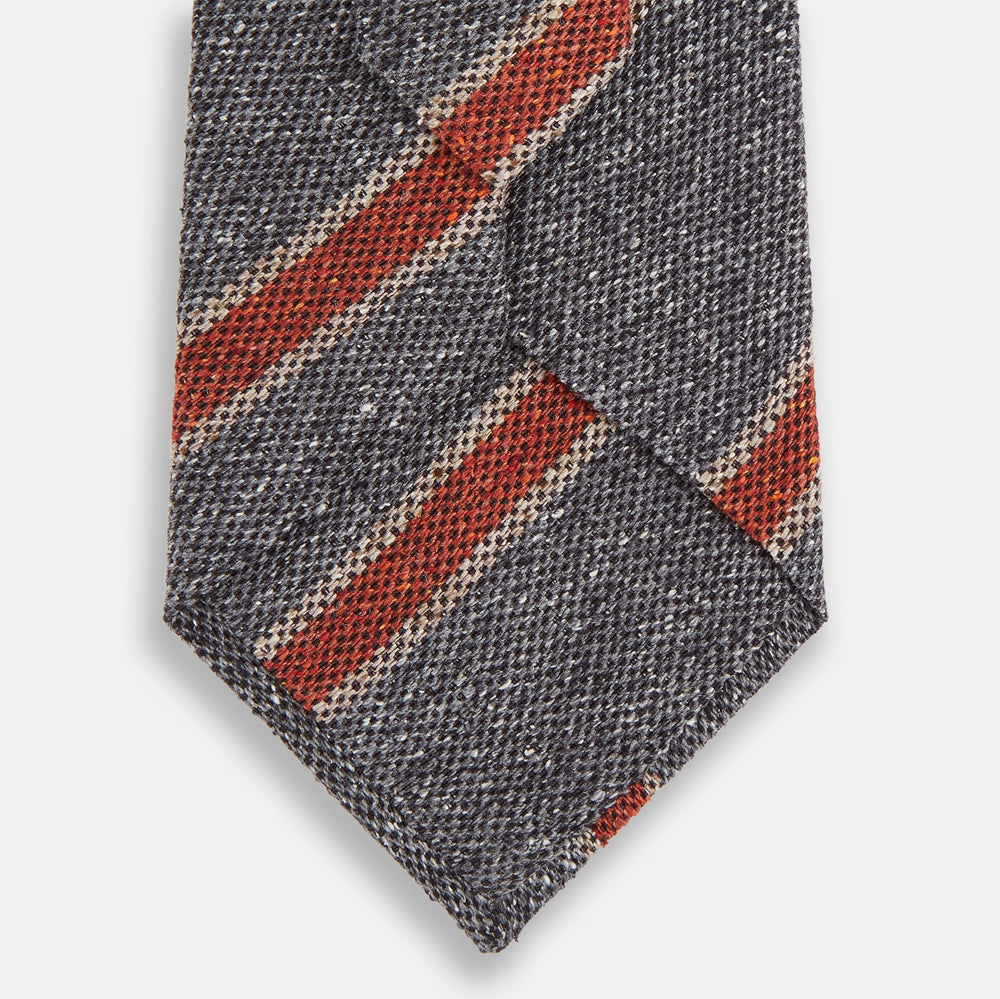 The Turnbull & Asser Red Block Stripe Silk Tie, featuring bold red stripes, is an elegant men's accessory displayed on a plain white background.