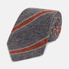 View 1 of product The Turnbull & Asser Red Block Stripe Silk Tie, featuring bold red stripes, is an elegant men's accessory displayed on a plain white background.