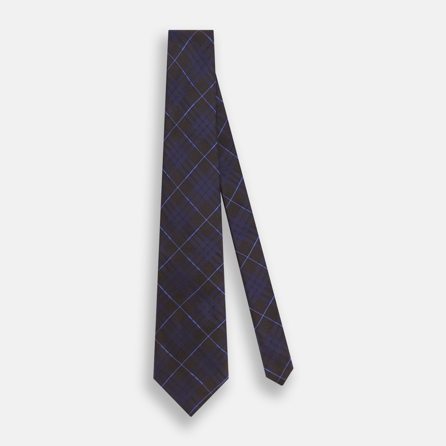 View 2 of product A rolled-up Green Tartan Silk Tie by Turnbull & Asser, featuring a classic tartan pattern on green silk and displayed against a light background—an elegant accessory to pair with Turnbull & Asser shirts.