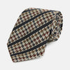 View 1 of product The Turnbull & Asser Brown Houndstooth Stripe Silk Tie features a houndstooth pattern with diagonal stripes, crafted from silk for a refined finish—ideal to pair with Turnbull & Asser shirts.