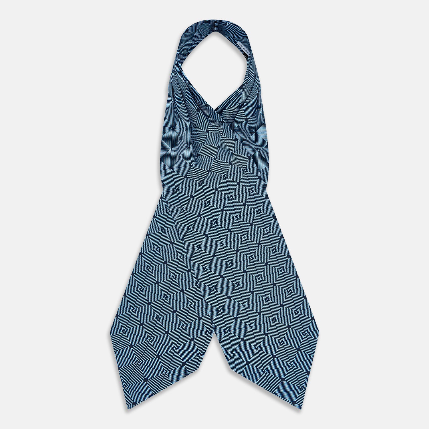 View 2 of product The Blue and Navy Concentric Square Printed Silk Cravat from Turnbull & Asser UK features a geometric blue and white design on a dark background, creating an optical illusion—an elegant wedding accessory.