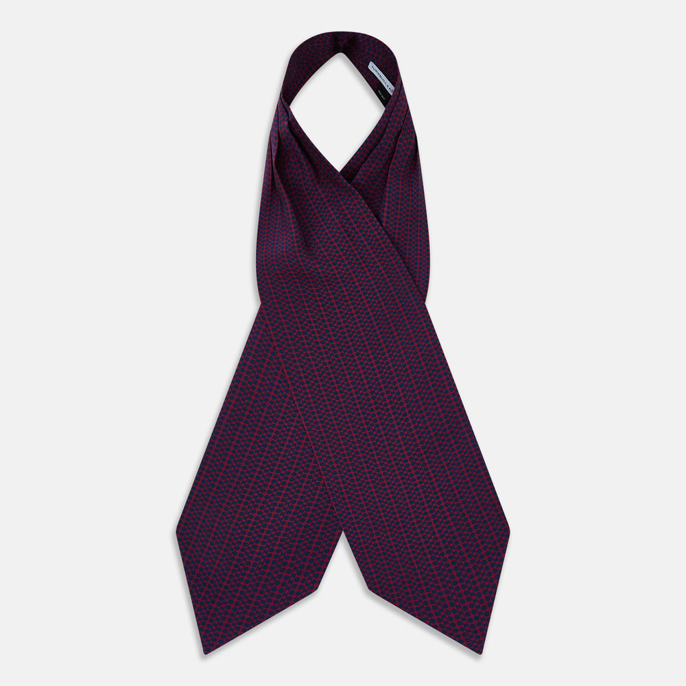 The Burgundy Micro-Dot Bar Printed Silk Cravat by Turnbull & Asser UK features a British style with a navy background, vertical red dots, and diagonal burgundy and navy stripes.