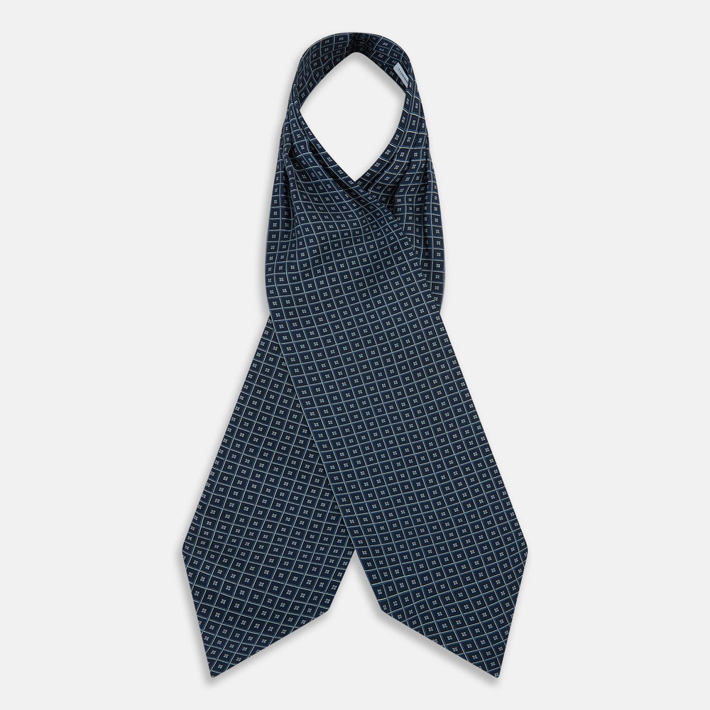 Geometric Navy Quatrefoil Motif Ascot Tie in Silk in navy blue with a repeating white and light blue geometric quatrefoil motif and fine grid lines.