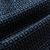 View 4 of product Geometric Navy Quatrefoil Motif Ascot Tie in Silk in navy blue with a repeating white and light blue geometric quatrefoil motif and fine grid lines.