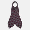 View 2 of product Turnbull & Asser UK Houndstooth Red Ascot Tie in silk, featuring a red printed houndstooth and windowpane check pattern of navy blue and white.