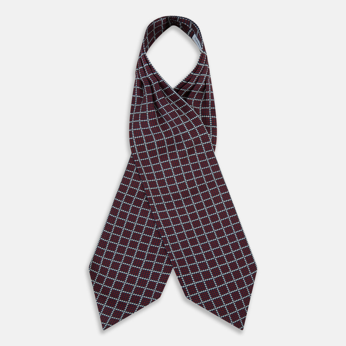 View 2 of product Turnbull & Asser UK Houndstooth Red Ascot Tie in silk, featuring a red printed houndstooth and windowpane check pattern of navy blue and white.