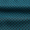 View 4 of product The Turquoise Geometric Silk Cravat by Turnbull & Asser features a striking teal and black pattern—perfect for those who appreciate bold, handmade neckwear with geometric flair.
