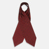View 2 of product The Turnbull & Asser Red Dot Silk Cravat is a red silk accessory with evenly spaced dark blue polka dots—neatly folded for a sharp finish and perfect for pairing with your favorite handmade neckwear.