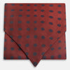 View 1 of product The Turnbull & Asser Red Dot Silk Cravat is a red silk accessory with evenly spaced dark blue polka dots—neatly folded for a sharp finish and perfect for pairing with your favorite handmade neckwear.