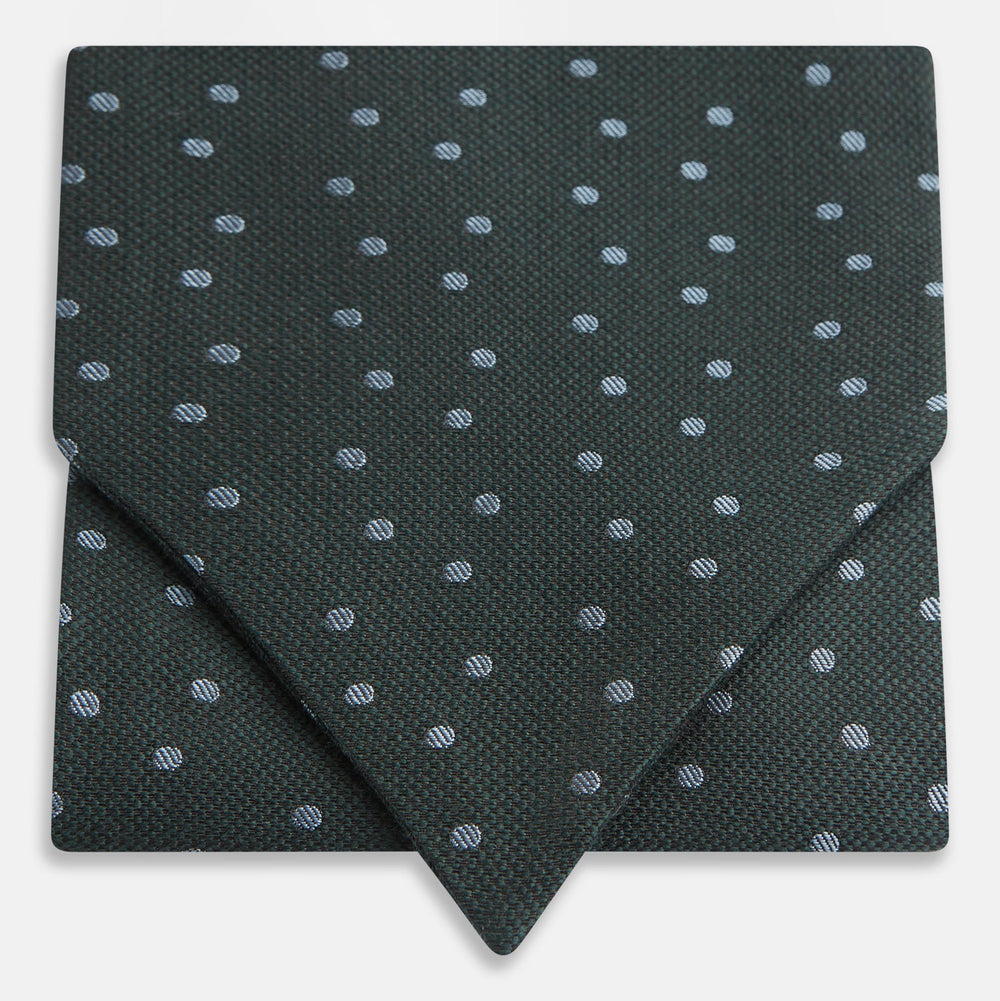 The Turnbull & Asser Pale Blue and Green Micro Dot Cravat features a refined micro dot pattern, blending pale blue and green for a sophisticated look—perfect for adding elegance to any ensemble.