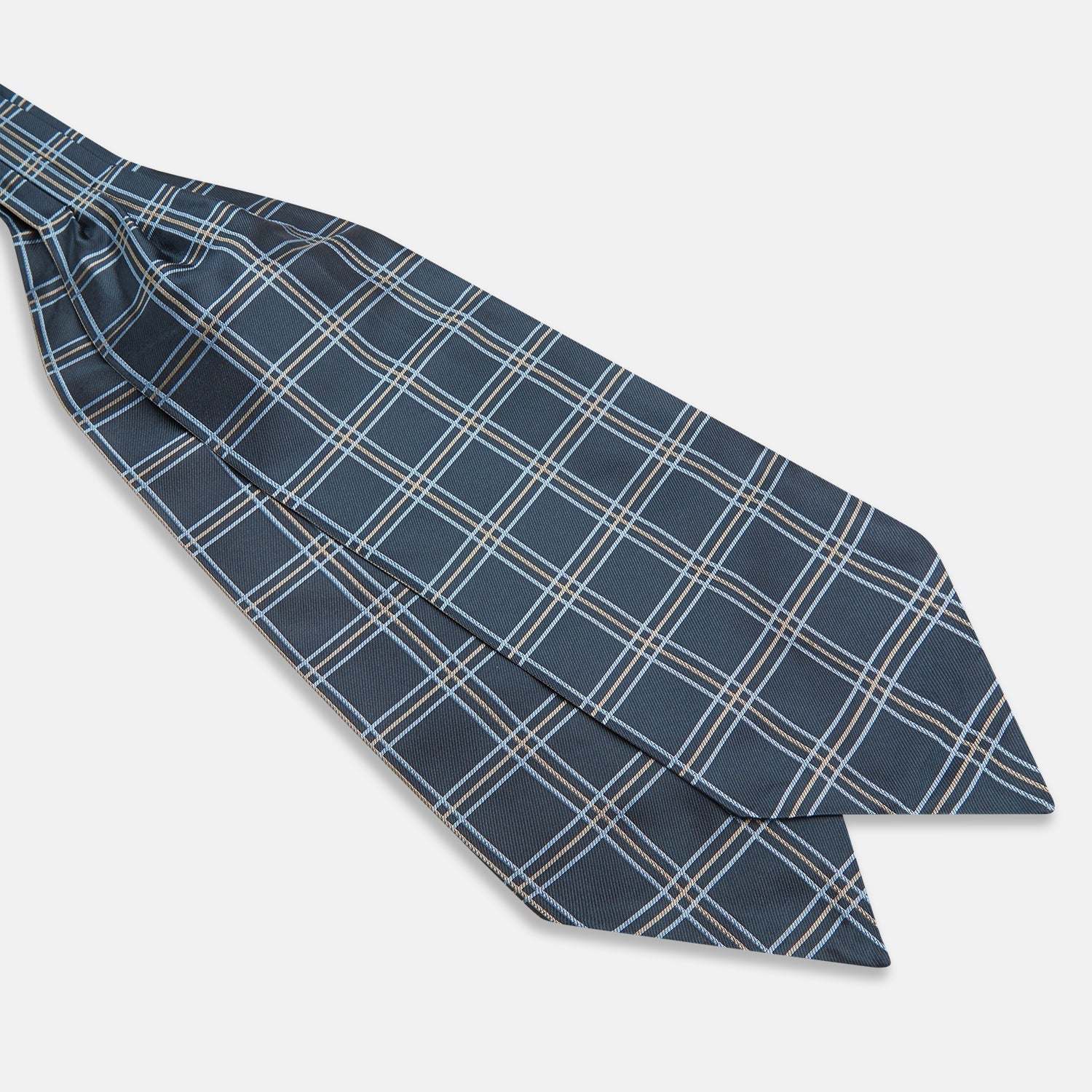View 3 of product The Turnbull & Asser Navy Triple Check Silk Cravat features a classic navy, white, and light blue plaid design—perfect for adding elegance to any outfit. Shown neatly folded on a white background.
