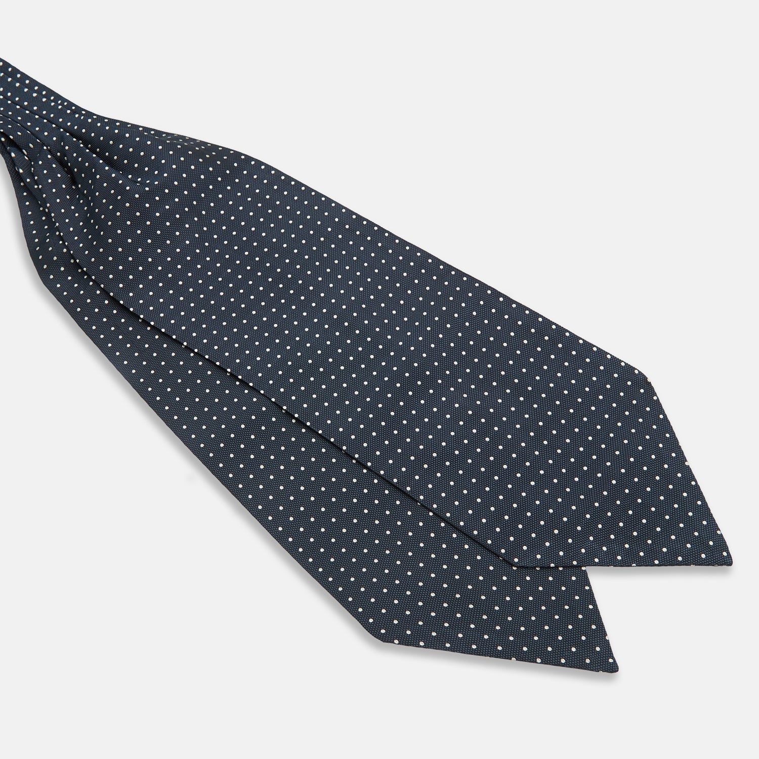 View 3 of product The Turnbull & Asser Navy Micro Dot Silk Cravat is a classic men's accessory, featuring subtle white polka dots—a sophisticated touch that pairs perfectly with a navy pocket square for timeless formal style.