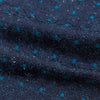 View 4 of product The Teal Micro Dot Silk Cravat by Turnbull & Asser is a formal accessory in textured dark blue silk, with small turquoise polka dots and a pointed edge at the bottom.