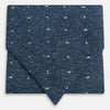 View 1 of product The Navy Micro Paisley Silk Cravat by Turnbull & Asser is a refined men's accessory, featuring subtle white paisley on silk—perfectly paired with a dark blue pocket square for an elegant formal look.