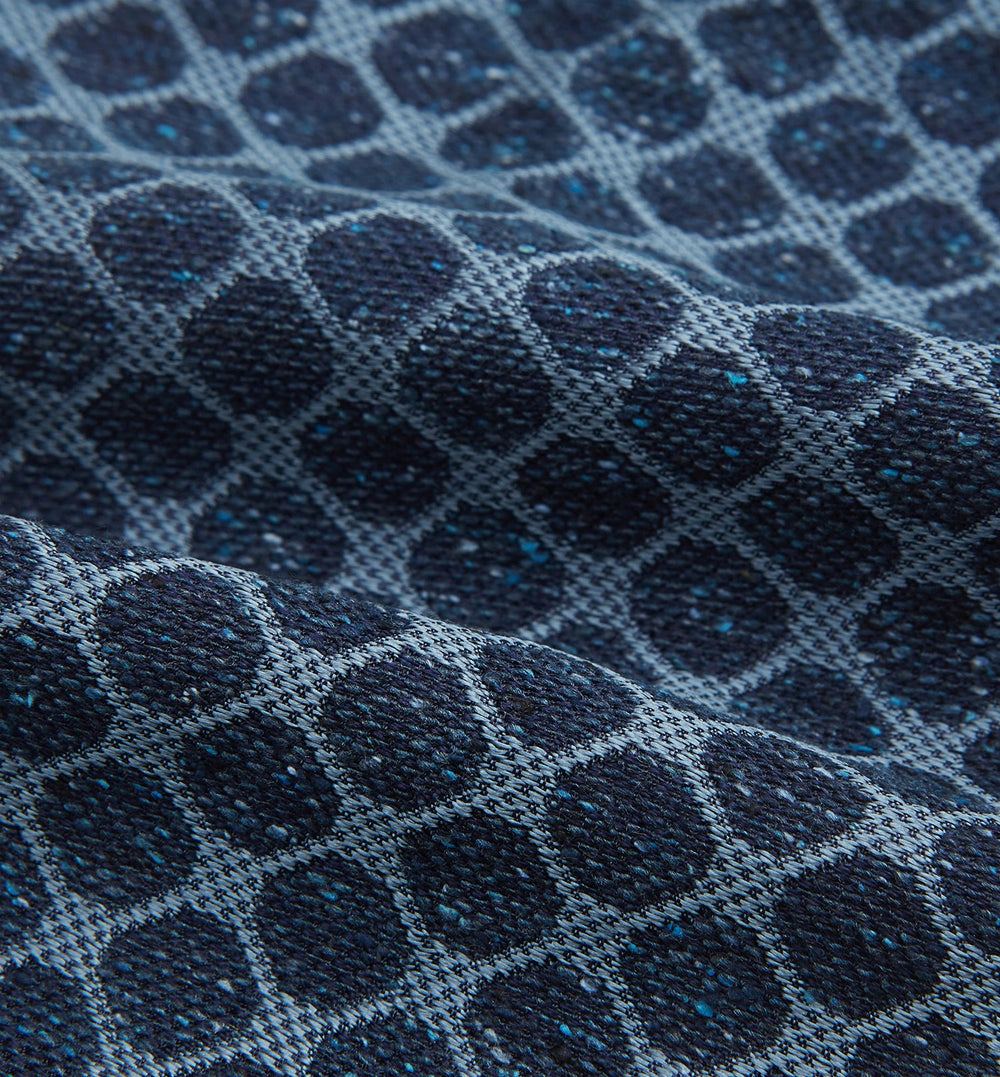 The Turnbull & Asser Navy Grid Silk Cravat features a textured hexagonal grid in dark and light blue on white—a refined, formal accessory perfect for any occasion.