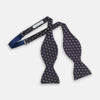 View 2 of product The Turnbull & Asser Blue Diamond Silk Bow Tie features small white diamond motifs on dark navy—perfect for adding classic British elegance to your formal look.