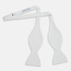View 2 of product The Turnbull & Asser White Marcella Bow Tie features a classic shape and textured finish, ideal for formal occasions and elegantly presented against a plain white background.